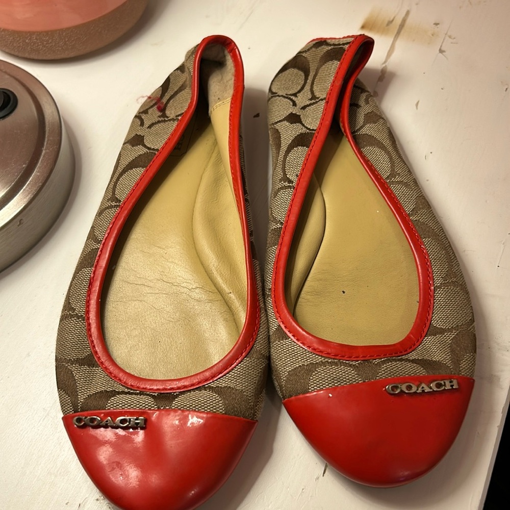 Coach ballet flats. Bright orange and brown